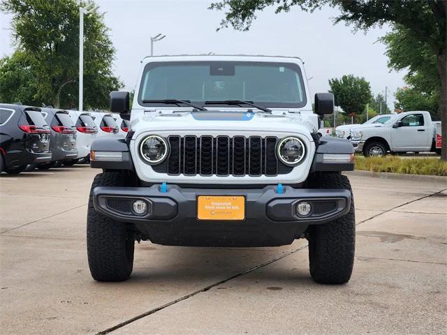 used 2024 Jeep Wrangler 4xe car, priced at $35,256