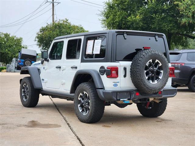 used 2024 Jeep Wrangler 4xe car, priced at $35,256