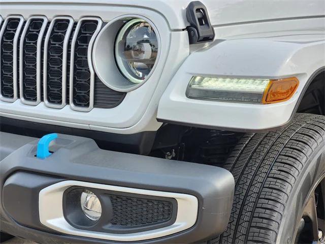 used 2024 Jeep Wrangler 4xe car, priced at $33,291