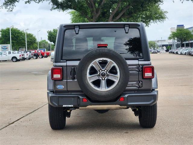 used 2021 Jeep Wrangler Unlimited car, priced at $31,459