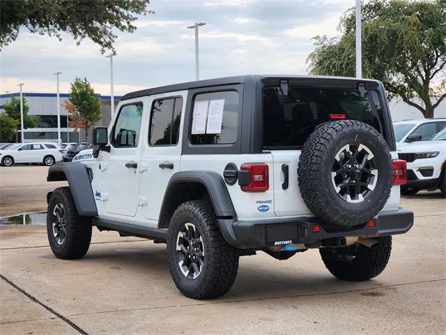used 2024 Jeep Wrangler 4xe car, priced at $34,075