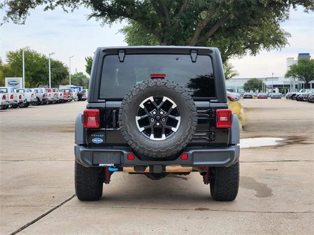 used 2024 Jeep Wrangler 4xe car, priced at $33,153
