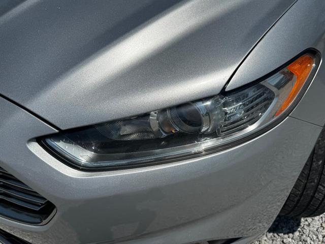 used 2016 Ford Fusion car, priced at $6,996