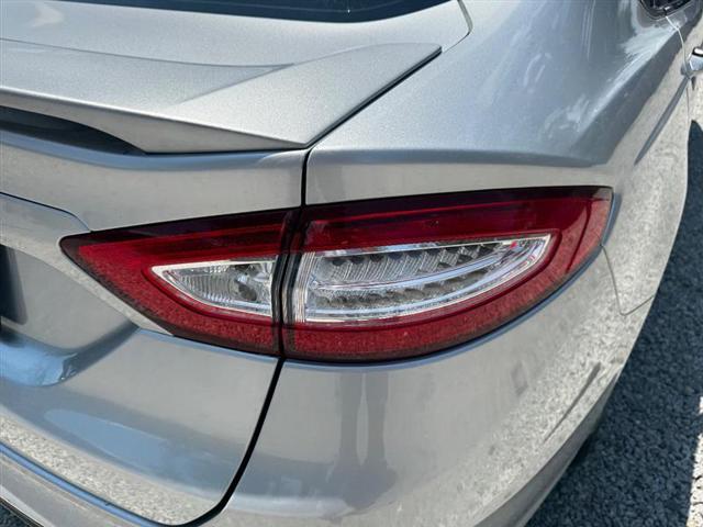 used 2016 Ford Fusion car, priced at $6,996