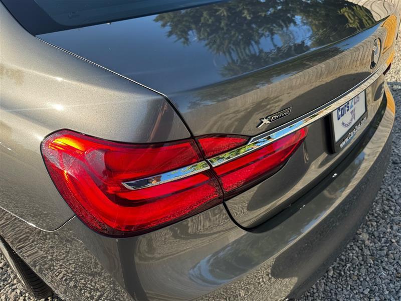 used 2016 BMW 750 car, priced at $17,496