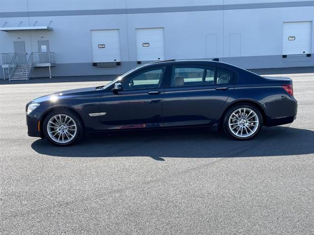 used 2015 BMW 740 car, priced at $14,296