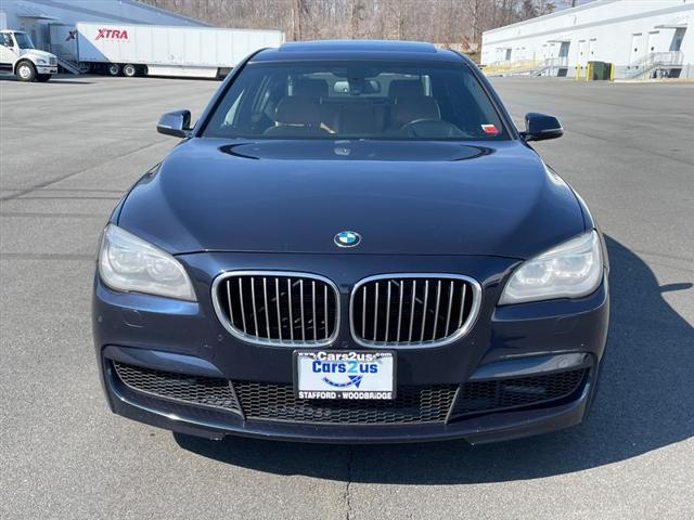 used 2015 BMW 740 car, priced at $14,296