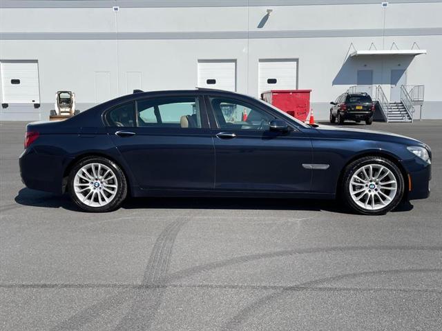 used 2015 BMW 740 car, priced at $14,296