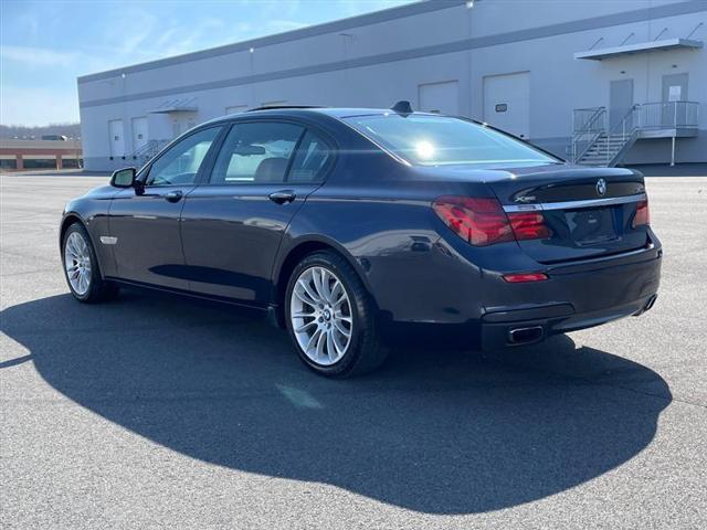 used 2015 BMW 740 car, priced at $14,296