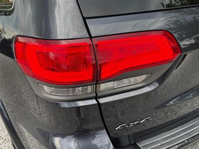 used 2014 Jeep Grand Cherokee car, priced at $10,496