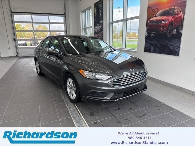 used 2018 Ford Fusion car, priced at $9,561