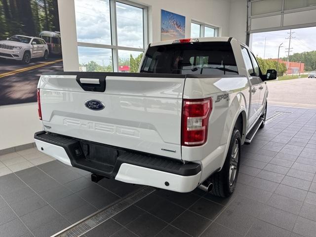 used 2018 Ford F-150 car, priced at $23,561