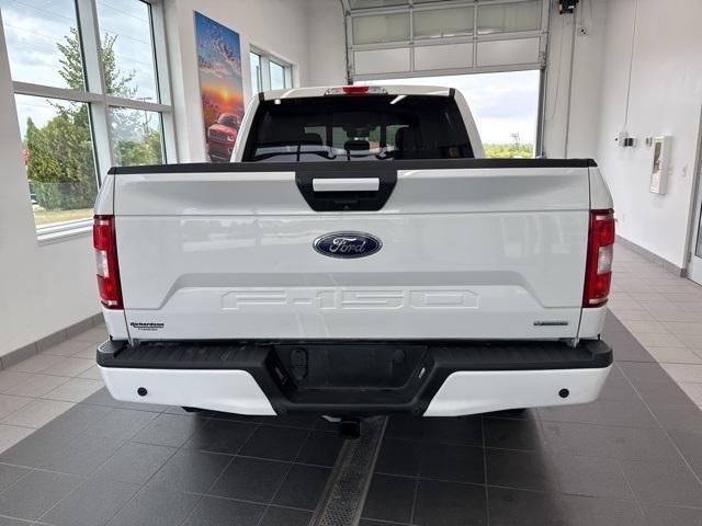 used 2018 Ford F-150 car, priced at $23,561