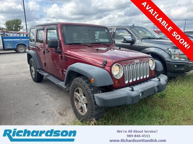 used 2012 Jeep Wrangler Unlimited car, priced at $11,995