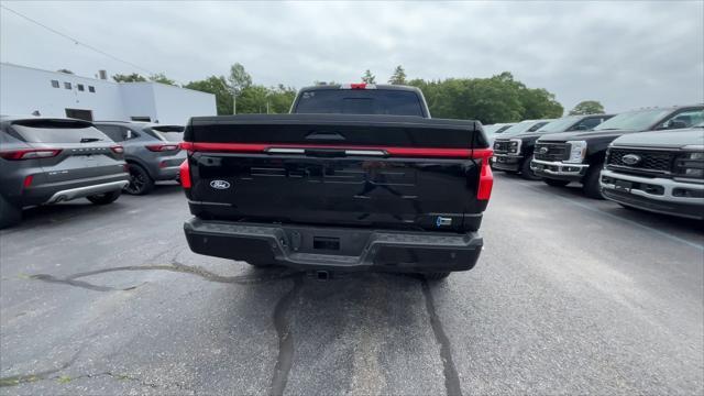 new 2025 Ford F-150 Lightning car, priced at $73,682