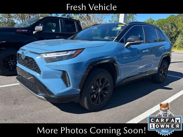 used 2022 Toyota RAV4 Hybrid car, priced at $30,000