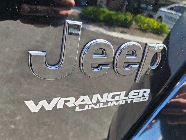 used 2021 Jeep Wrangler Unlimited car, priced at $32,988