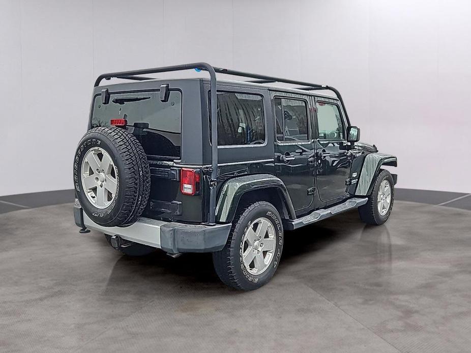 used 2011 Jeep Wrangler Unlimited car, priced at $14,700