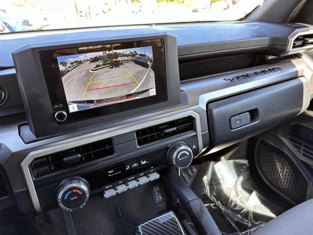 used 2024 Toyota Tacoma car, priced at $32,000