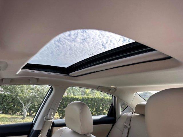 used 2015 Nissan Altima car, priced at $9,800