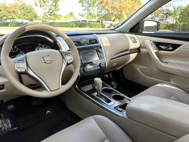 used 2015 Nissan Altima car, priced at $9,800