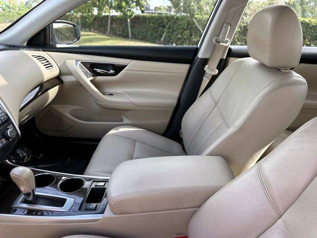 used 2015 Nissan Altima car, priced at $9,800