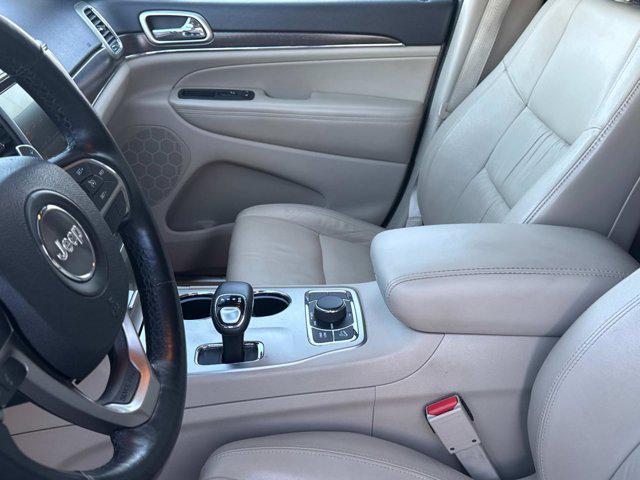 used 2014 Jeep Grand Cherokee car, priced at $10,698