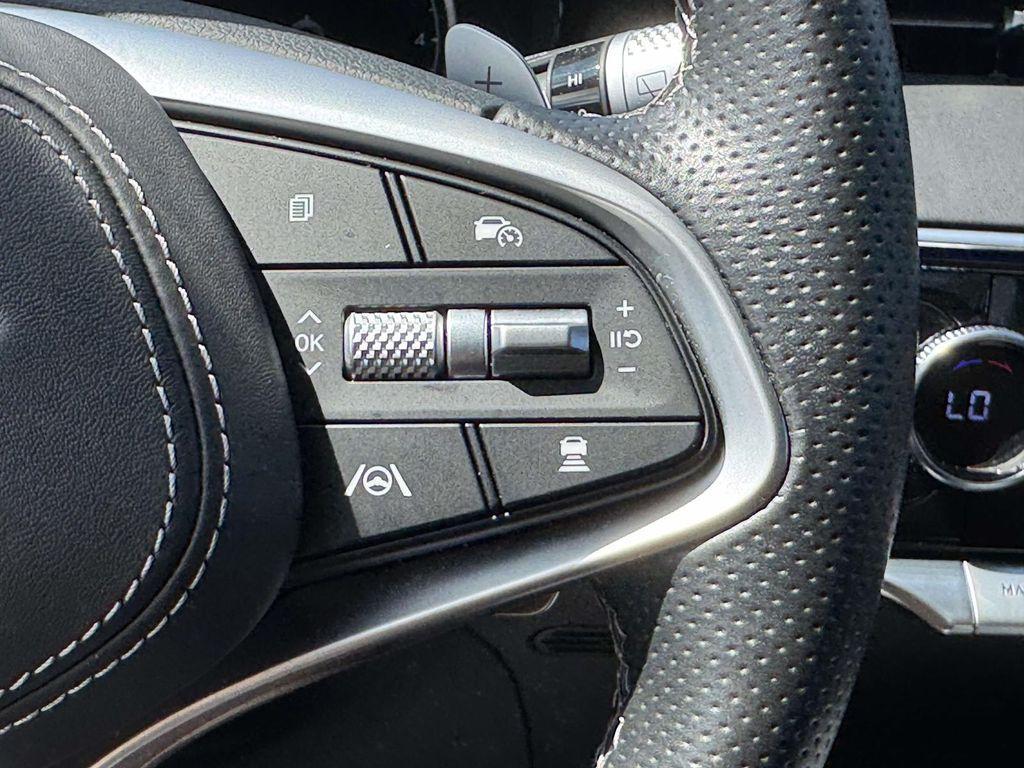 used 2025 Genesis GV70 car, priced at $59,995