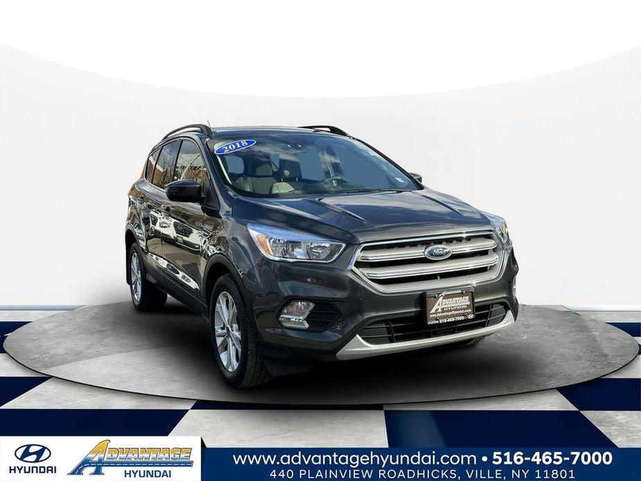 used 2018 Ford Escape car, priced at $13,500