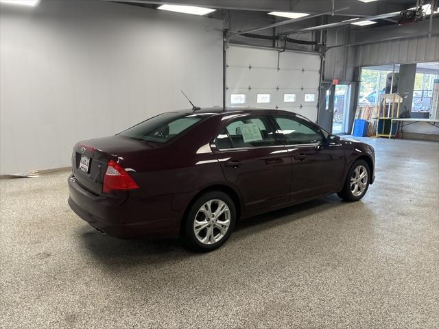 used 2012 Ford Fusion car, priced at $6,990