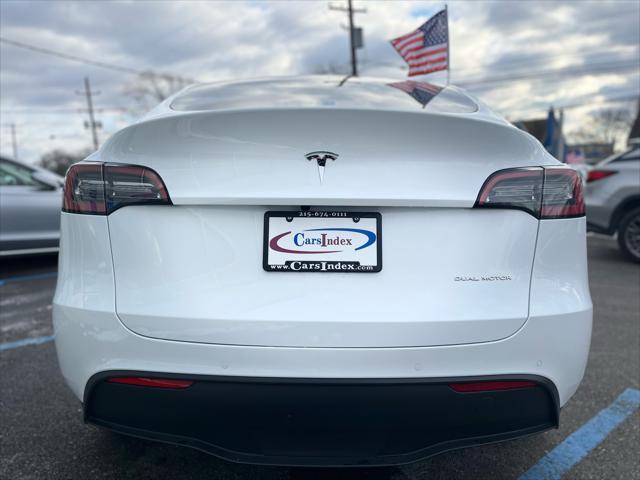 used 2021 Tesla Model Y car, priced at $30,799