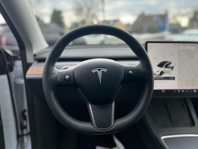 used 2021 Tesla Model Y car, priced at $30,799