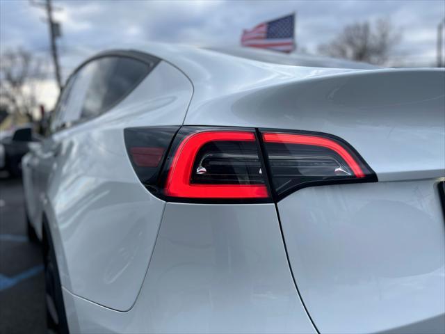 used 2021 Tesla Model Y car, priced at $30,799