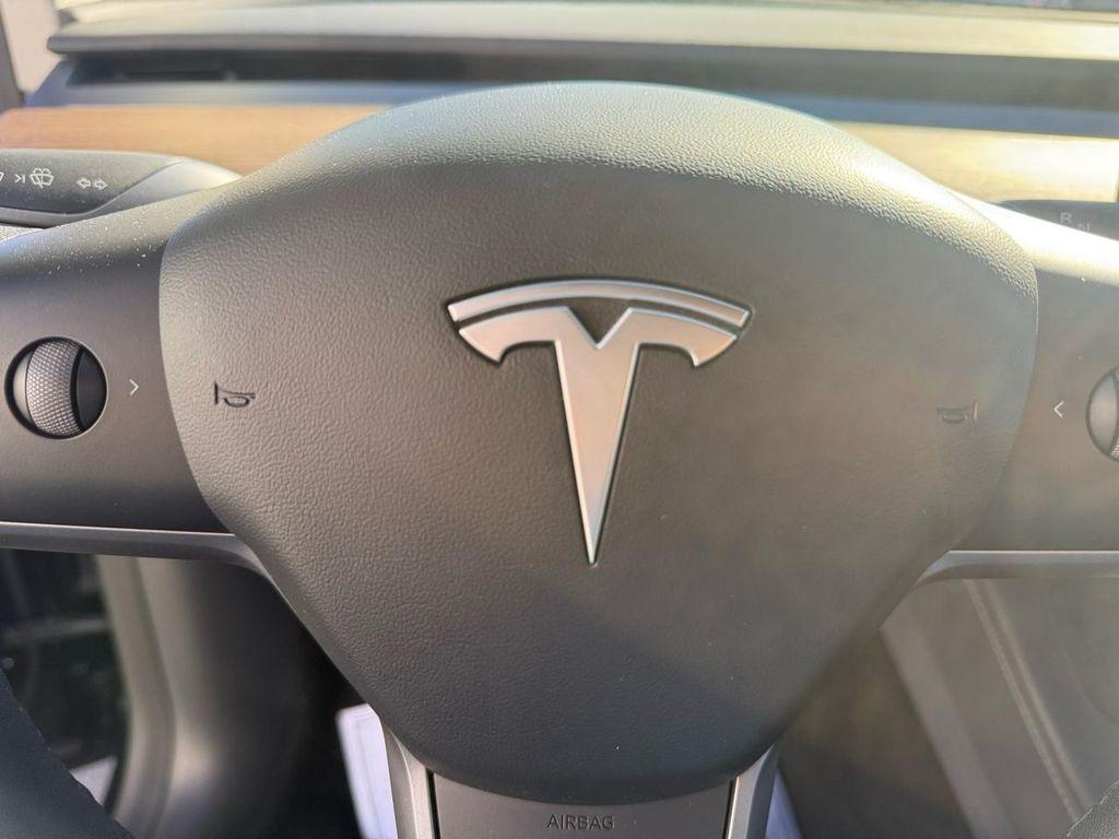 used 2022 Tesla Model Y car, priced at $29,499