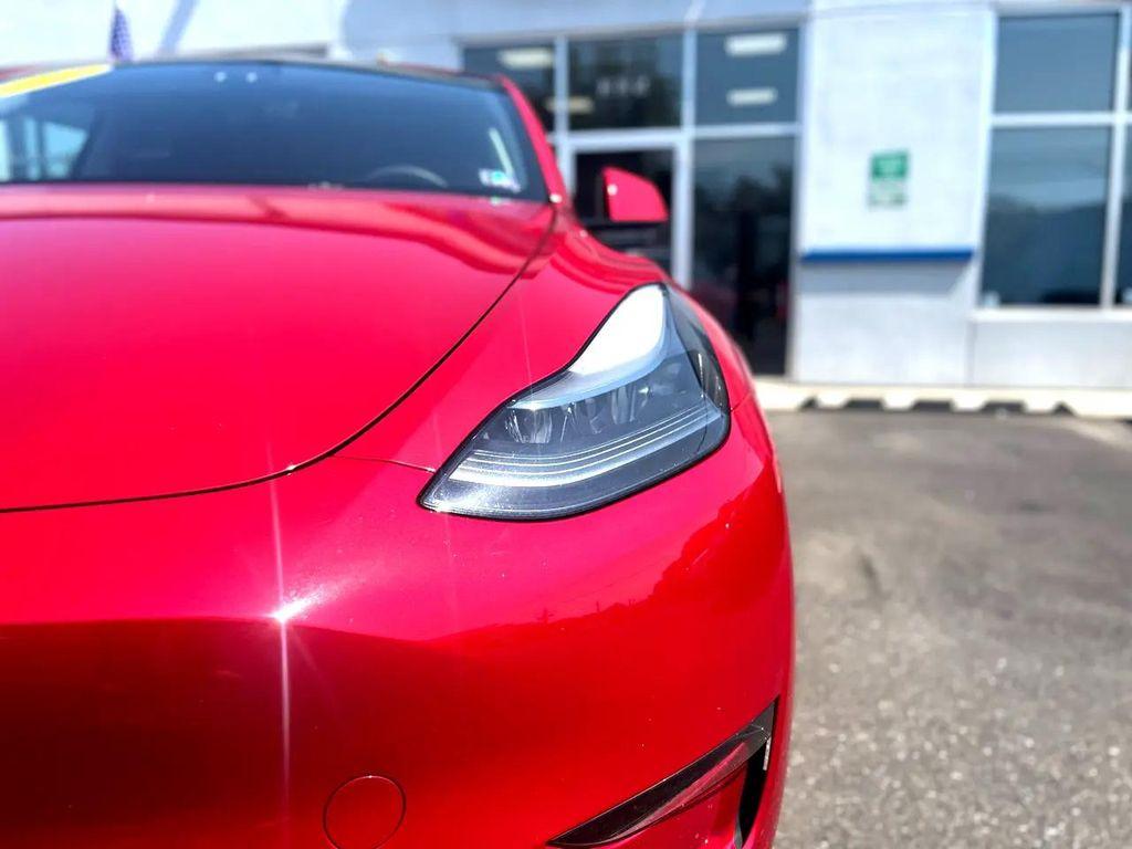 used 2023 Tesla Model Y car, priced at $32,999