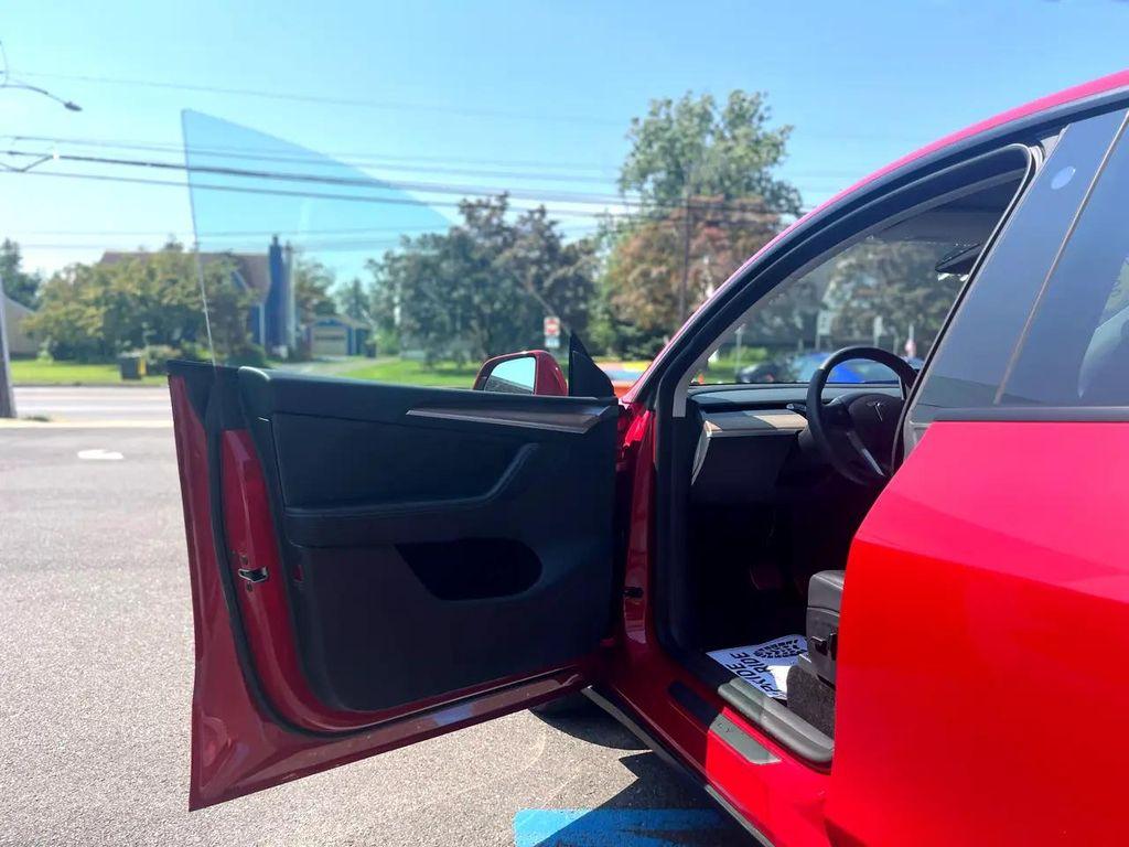 used 2023 Tesla Model Y car, priced at $32,999