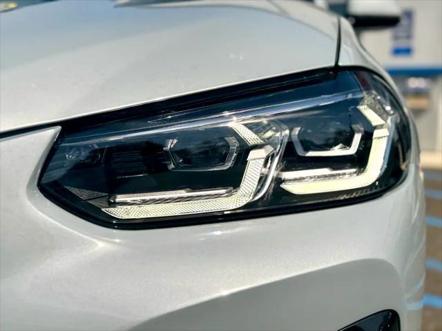 used 2022 BMW X4 car, priced at $37,399