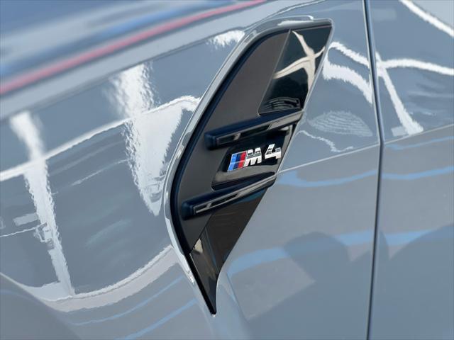 used 2021 BMW M4 car, priced at $49,999