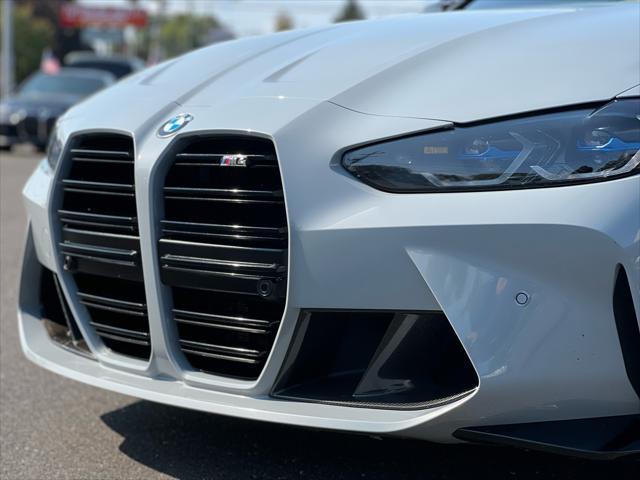 used 2021 BMW M4 car, priced at $49,999