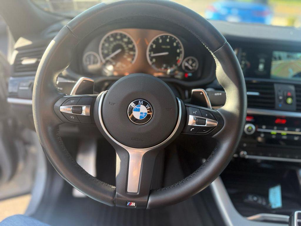used 2018 BMW X4 car, priced at $27,499