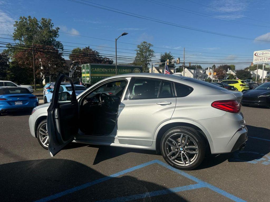 used 2018 BMW X4 car, priced at $27,499