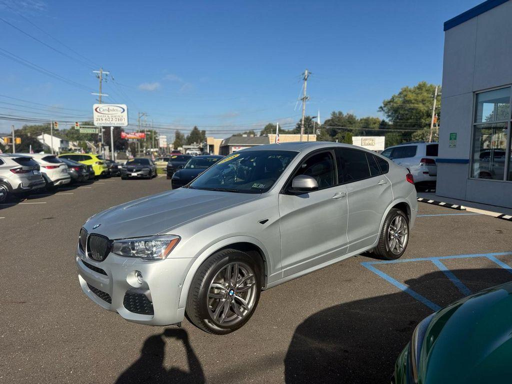 used 2018 BMW X4 car, priced at $27,499