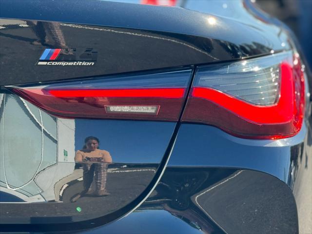 used 2024 BMW M4 car, priced at $84,999