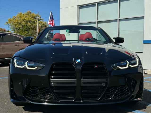 used 2024 BMW M4 car, priced at $84,999