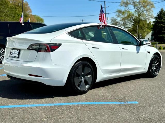 used 2023 Tesla Model 3 car, priced at $27,999