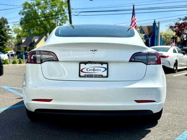 used 2023 Tesla Model 3 car, priced at $27,999