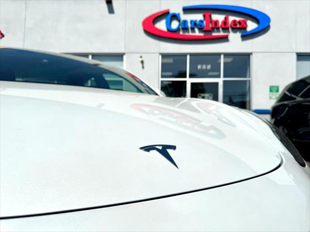 used 2023 Tesla Model 3 car, priced at $27,999