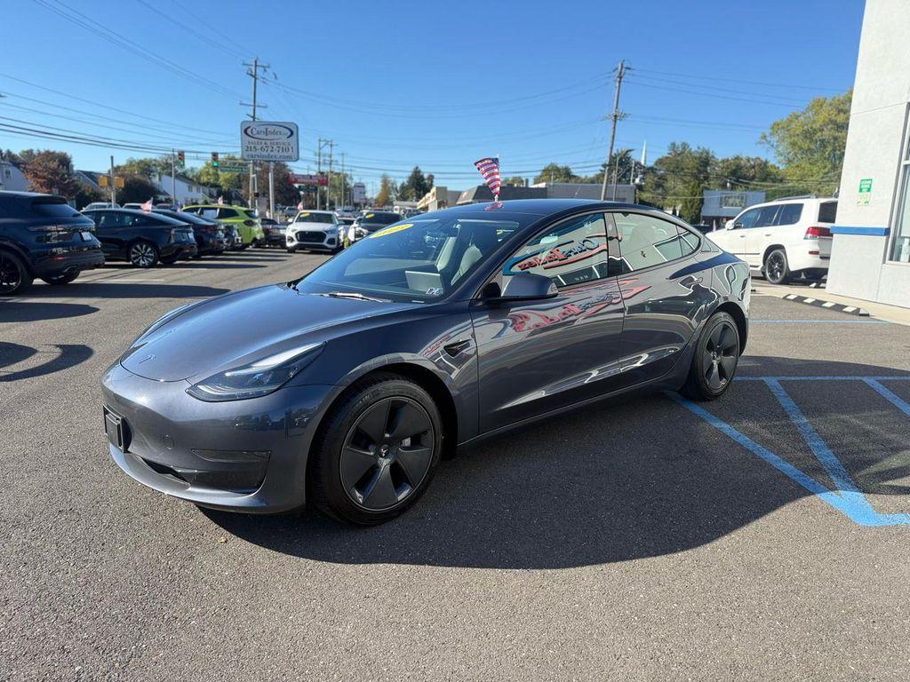 used 2023 Tesla Model 3 car, priced at $25,499