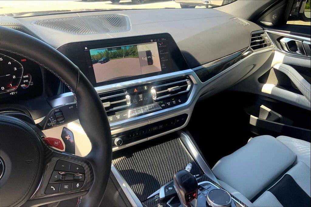 used 2023 BMW M4 car, priced at $74,998