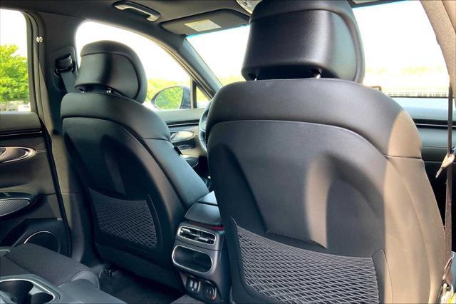 used 2025 Genesis GV70 car, priced at $57,798